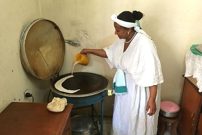 Market Tour and Cooking Class with a Coffee Ceremony at a Home in Addis Ababa - Learning injera in an Addis Ababa kitchen